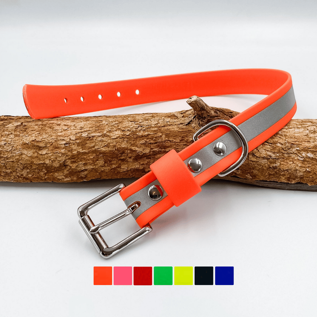 Orange reflective BioThane dog collar with silver hardware, handmade by Kinfolk Leather NZ