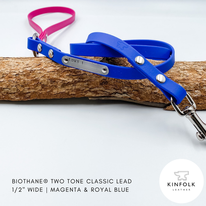 Two-tone blue and magenta leather dog lead on a white background with Kinfolk Leather branding.