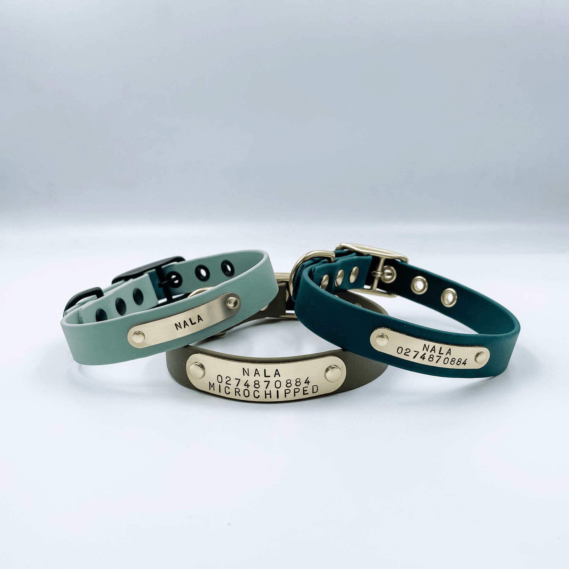 Custom Made Dog Collar with handstamped nameplate - Waterproof Biothane and Solid Brass - View showing Green collars with brass nameplate - Kinfolk Leather